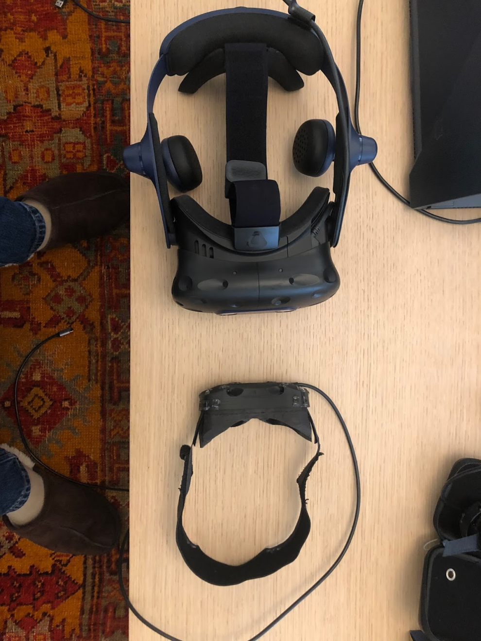 Beyond prototype shown alongside other VR hardware for size comparison